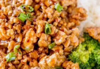 Orange Ground Chicken With White Rice And Broccoli